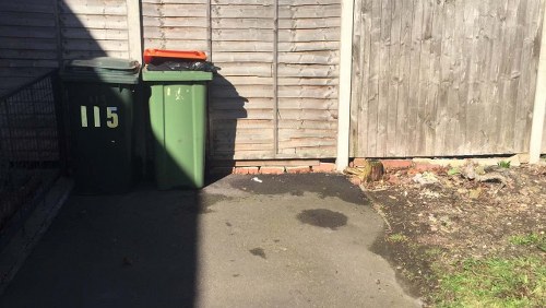 Workers managing construction waste on site