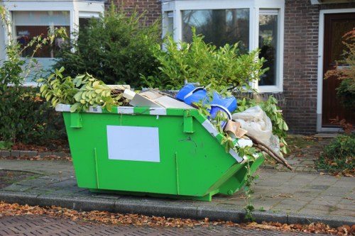 Office clearance team managing electronic waste responsibly